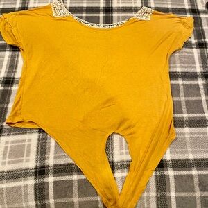 Sexy, wand casual top, mustard color, Size Small.